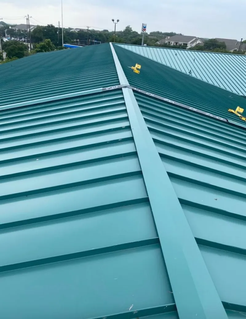 Green commercial metal roof ridge and valley for Metal Roof Repair in Johnson Lane